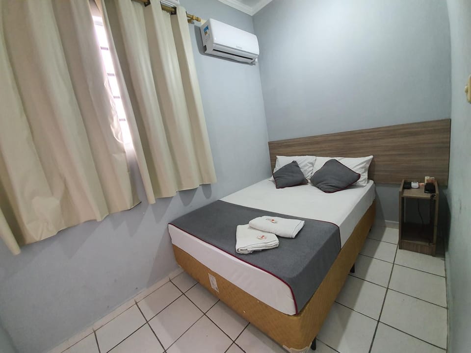 Bed, Photo of the whole room, Bedroom, towels, air conditioner