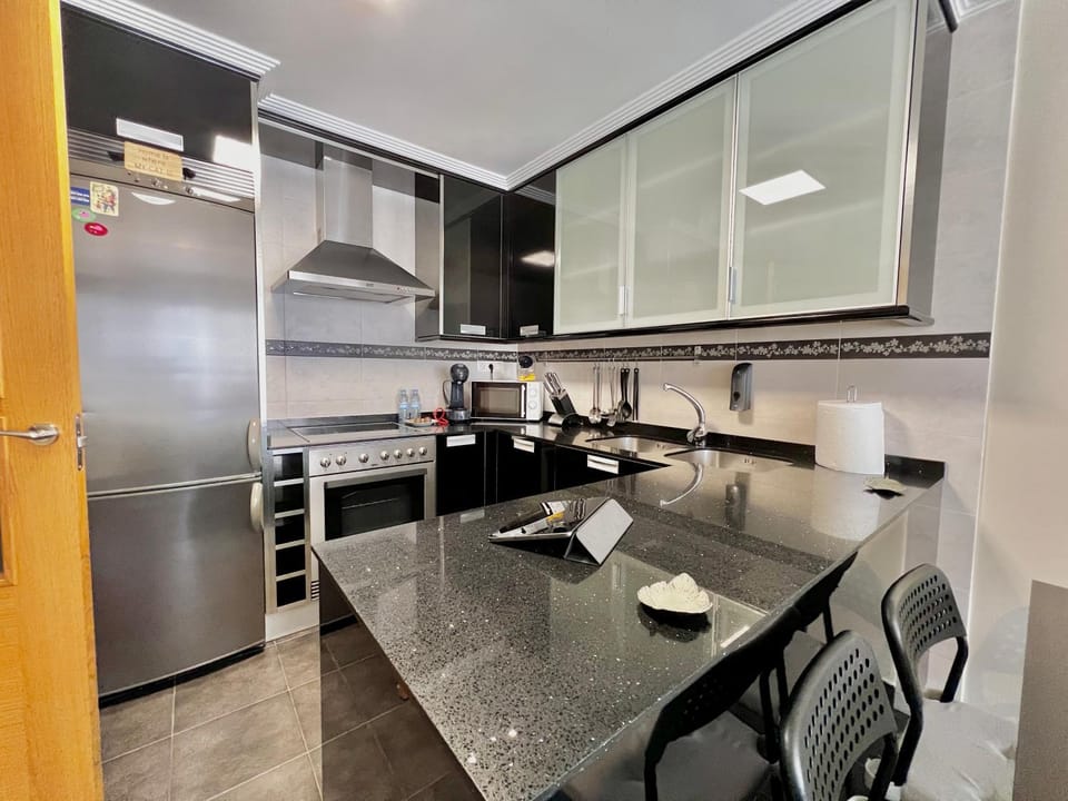 Kitchen or kitchenette, oven, stove