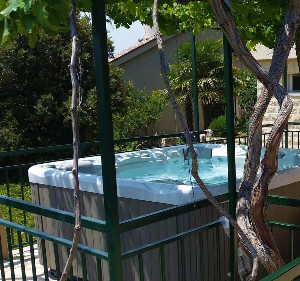 Holiday house Tender near Trogir, jacuzzi Villa in Šibenik-Knin County, Croatia