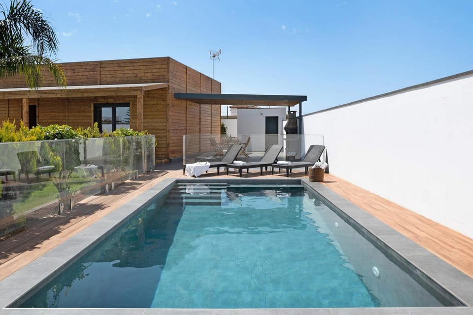 Property building, Living room, Swimming pool