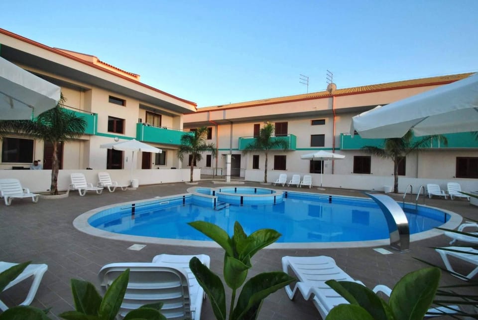 Property building, Pool view, Swimming pool, sunbed