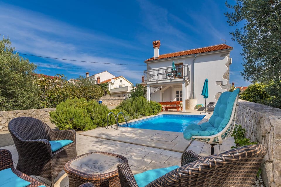 Property building, Seating area, Swimming pool