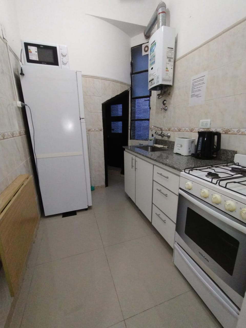 Kitchen or kitchenette, oven