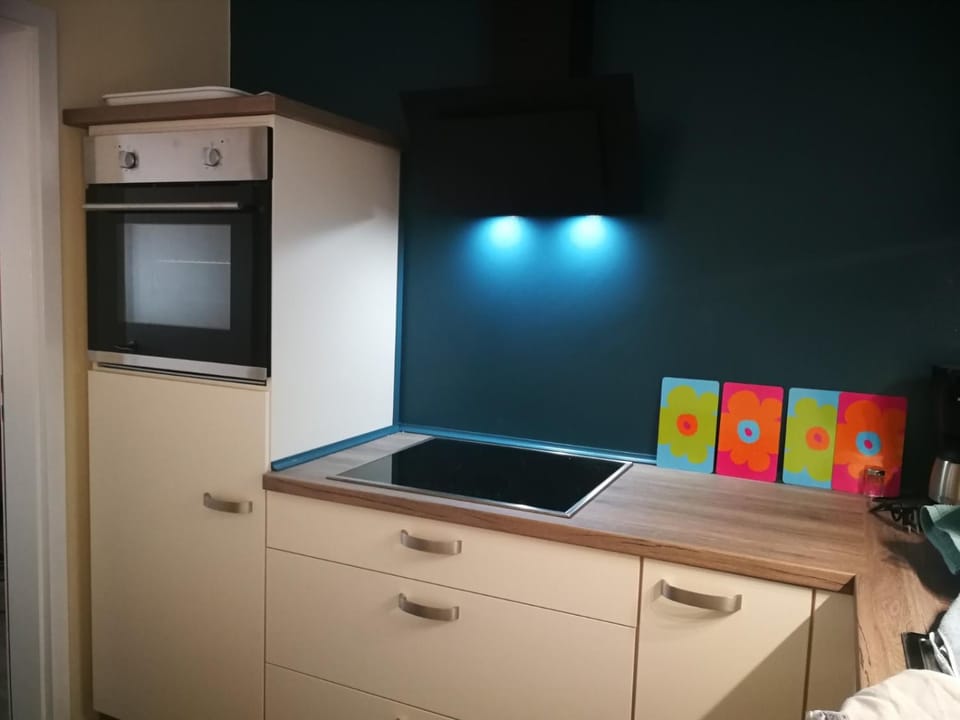 Kitchen or kitchenette, oven, stove