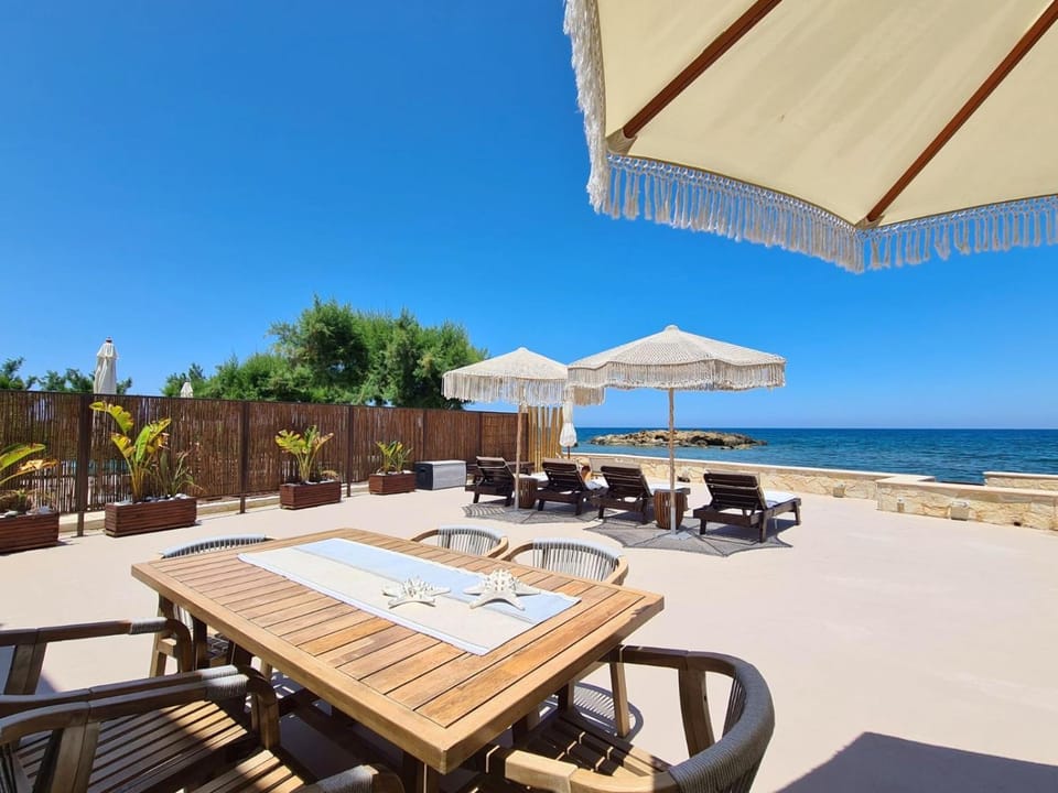 Patio, Day, Natural landscape, Dining area, Beach, Sea view, sunbed