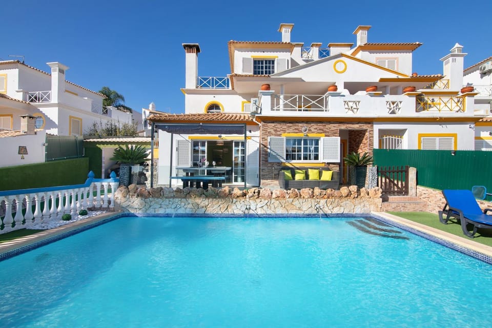 Property building, Living room, Swimming pool