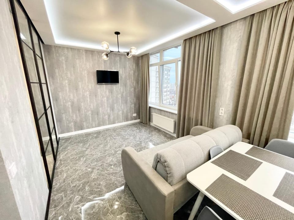Сozy 704 Sunrise Apartments on the 22nd floor in the center Apartment in Odessa