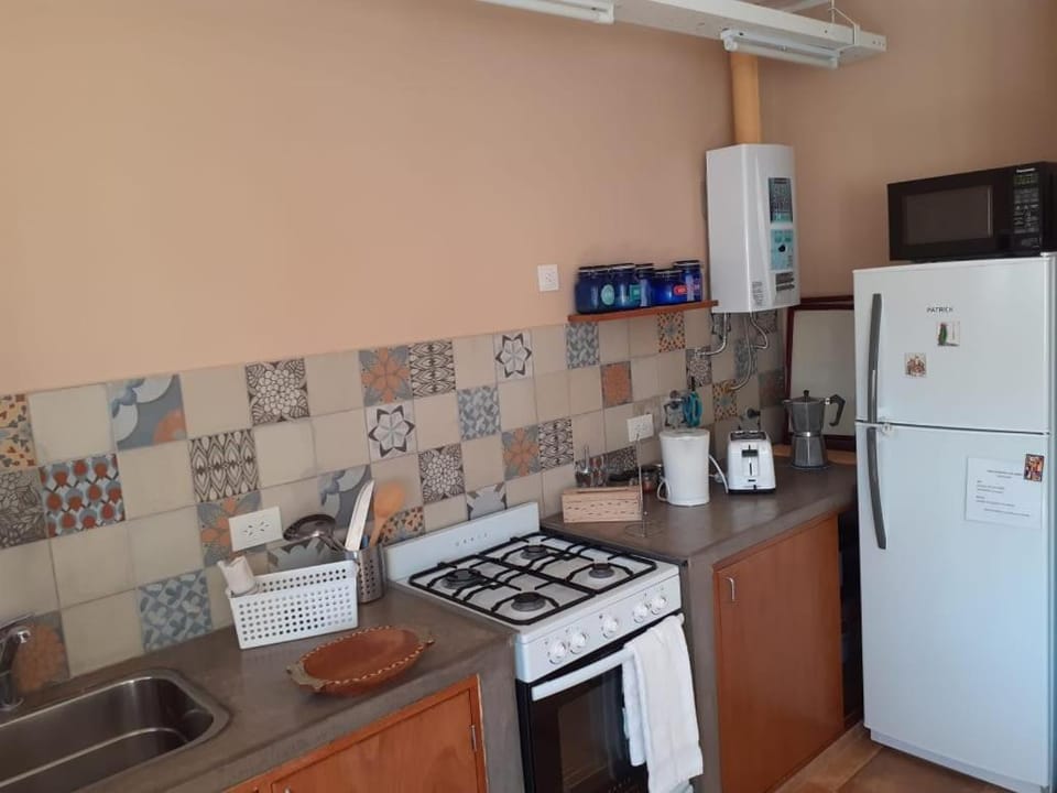 Kitchen or kitchenette, oven, toaster