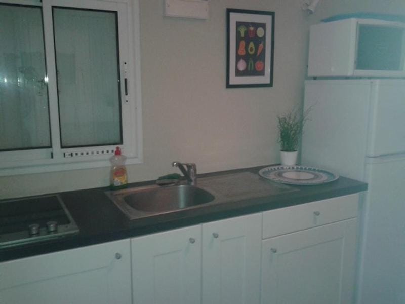 Kitchen or kitchenette, stove