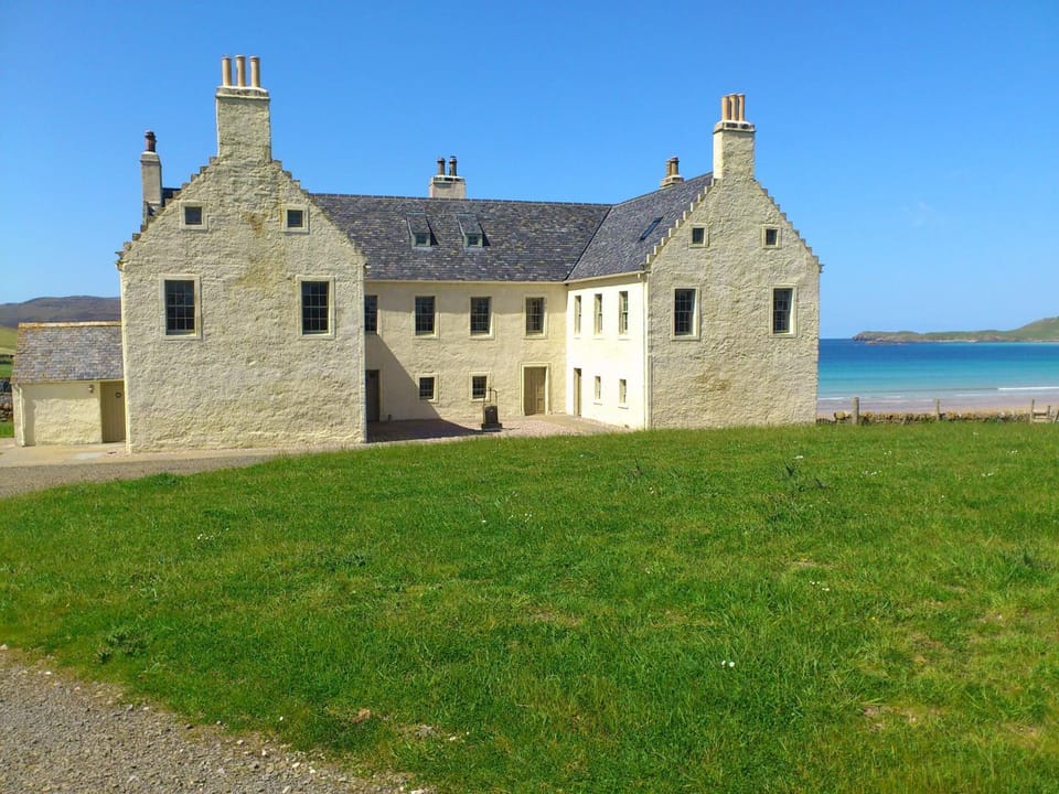 Property building, Day, Natural landscape, Beach, Beach, Mountain view, Mountain view, Sea view