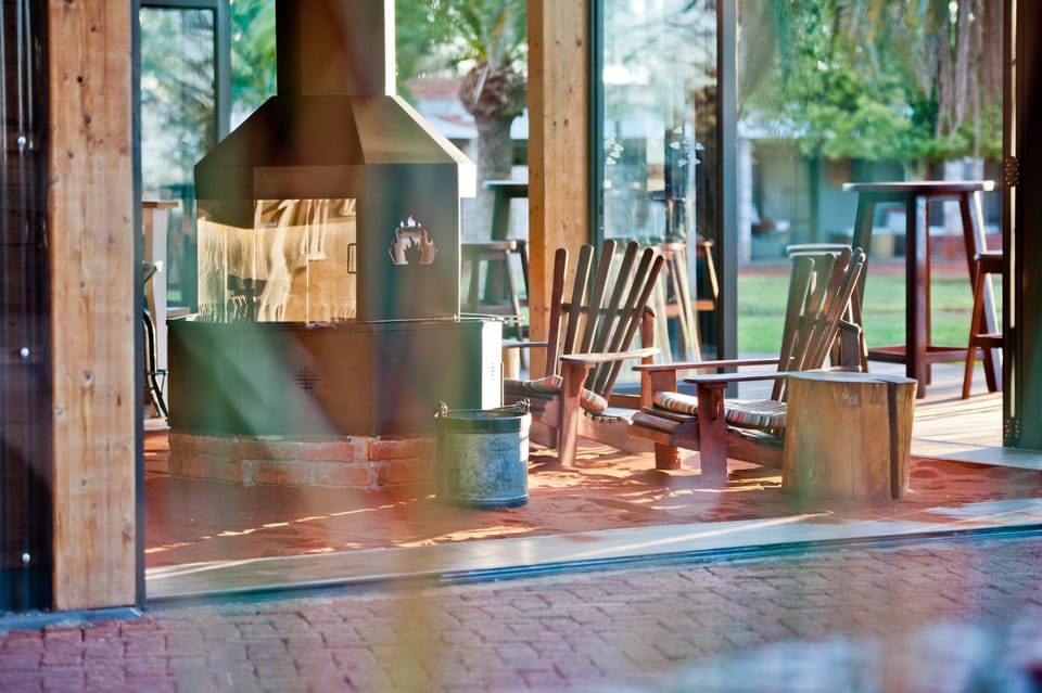 Patio, Restaurant/places to eat, Day, Balcony/Terrace, Seating area, Entertainment