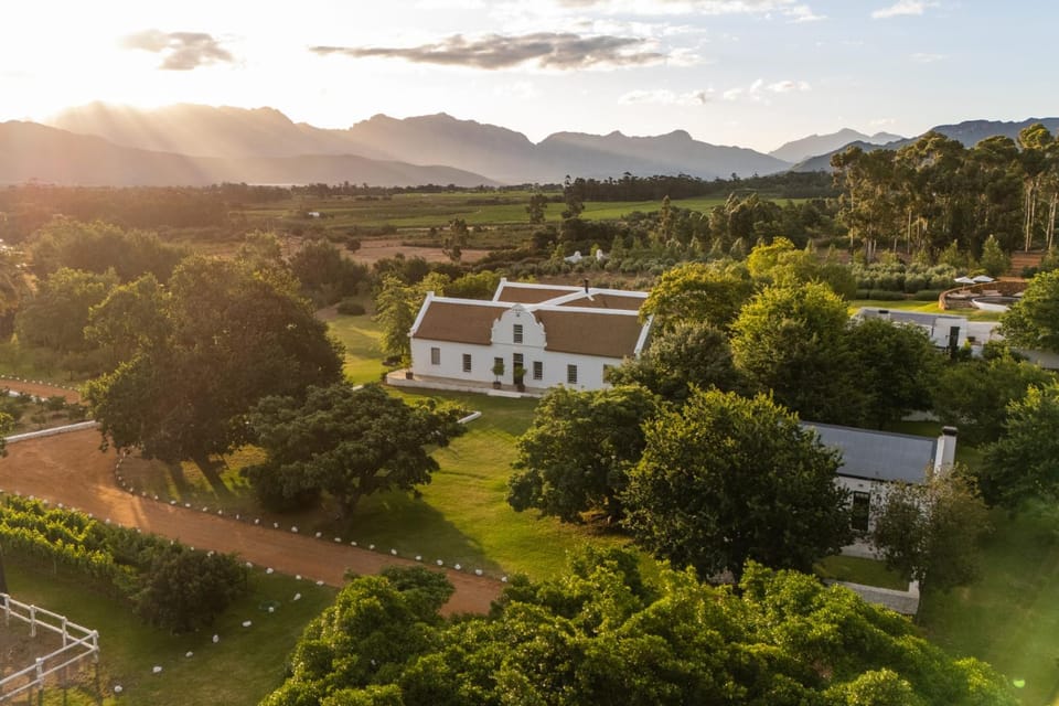 Property building, Natural landscape, Bird's eye view, Mountain view, Sunset