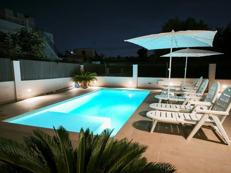 Property building, Living room, Swimming pool