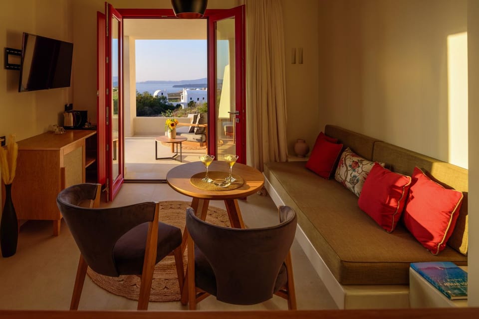 TV and multimedia, View (from property/room), Living room, Seating area, Sea view