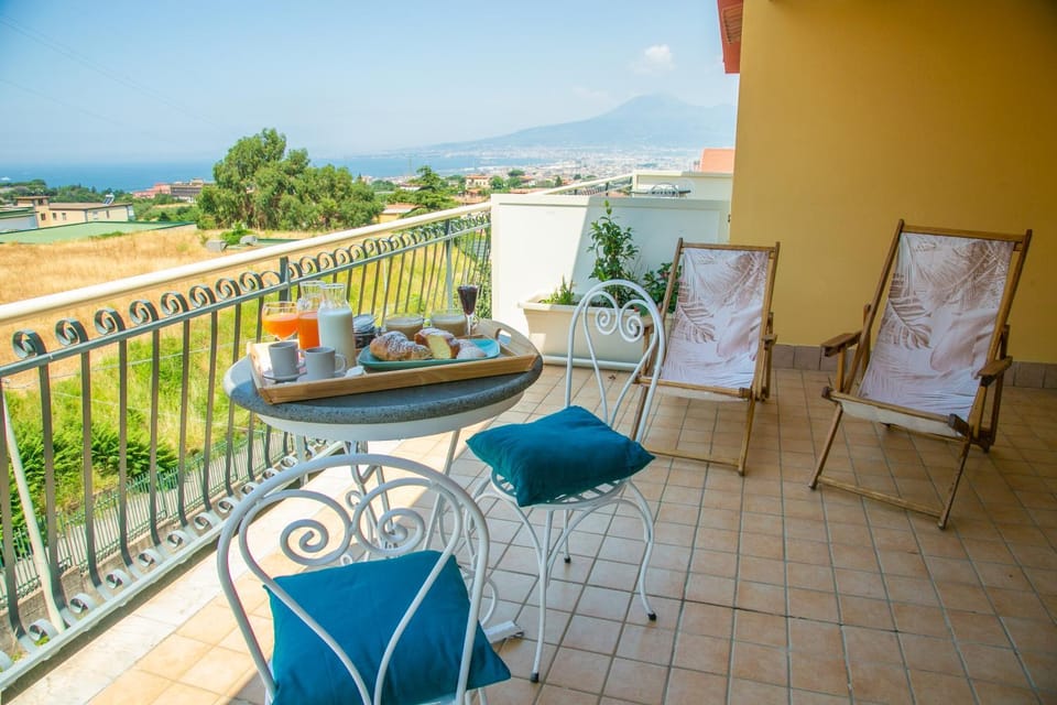 Patio, Day, Natural landscape, View (from property/room), Balcony/Terrace, Living room, Seating area, Dining area, Mountain view, Sea view, sunbed
