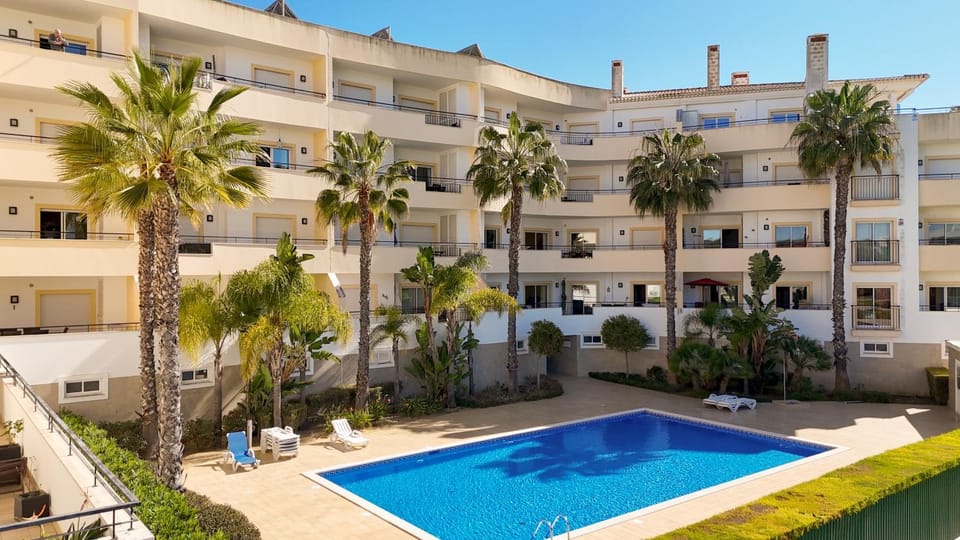 Property building, Pool view, Swimming pool, sunbed