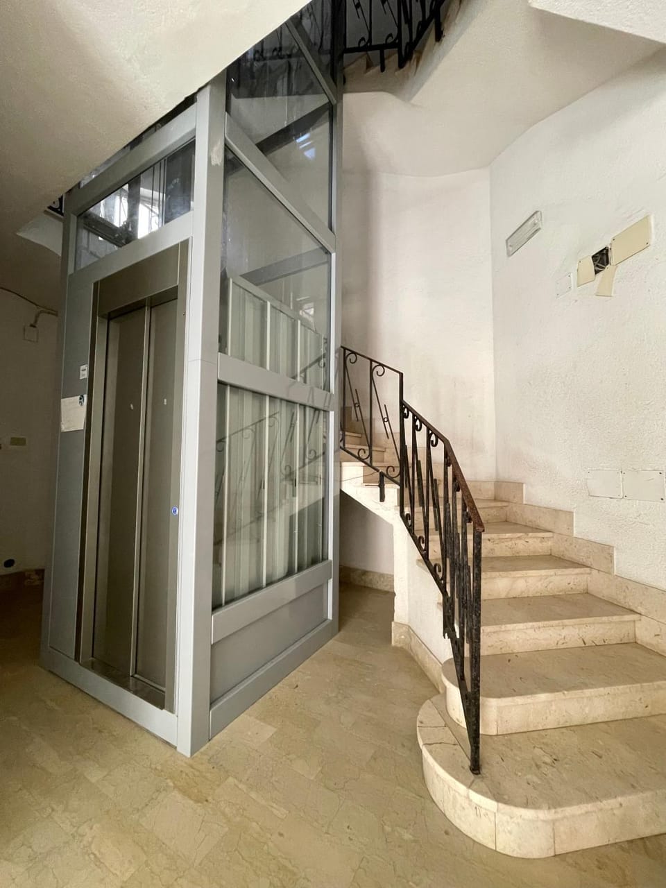 Property building, elevator