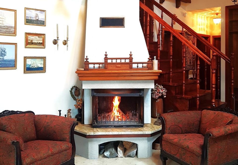 Living room, Seating area, fireplace, fireplace, flat iron