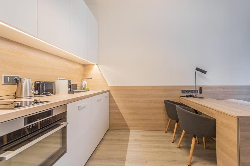Kitchen or kitchenette, oven, toaster