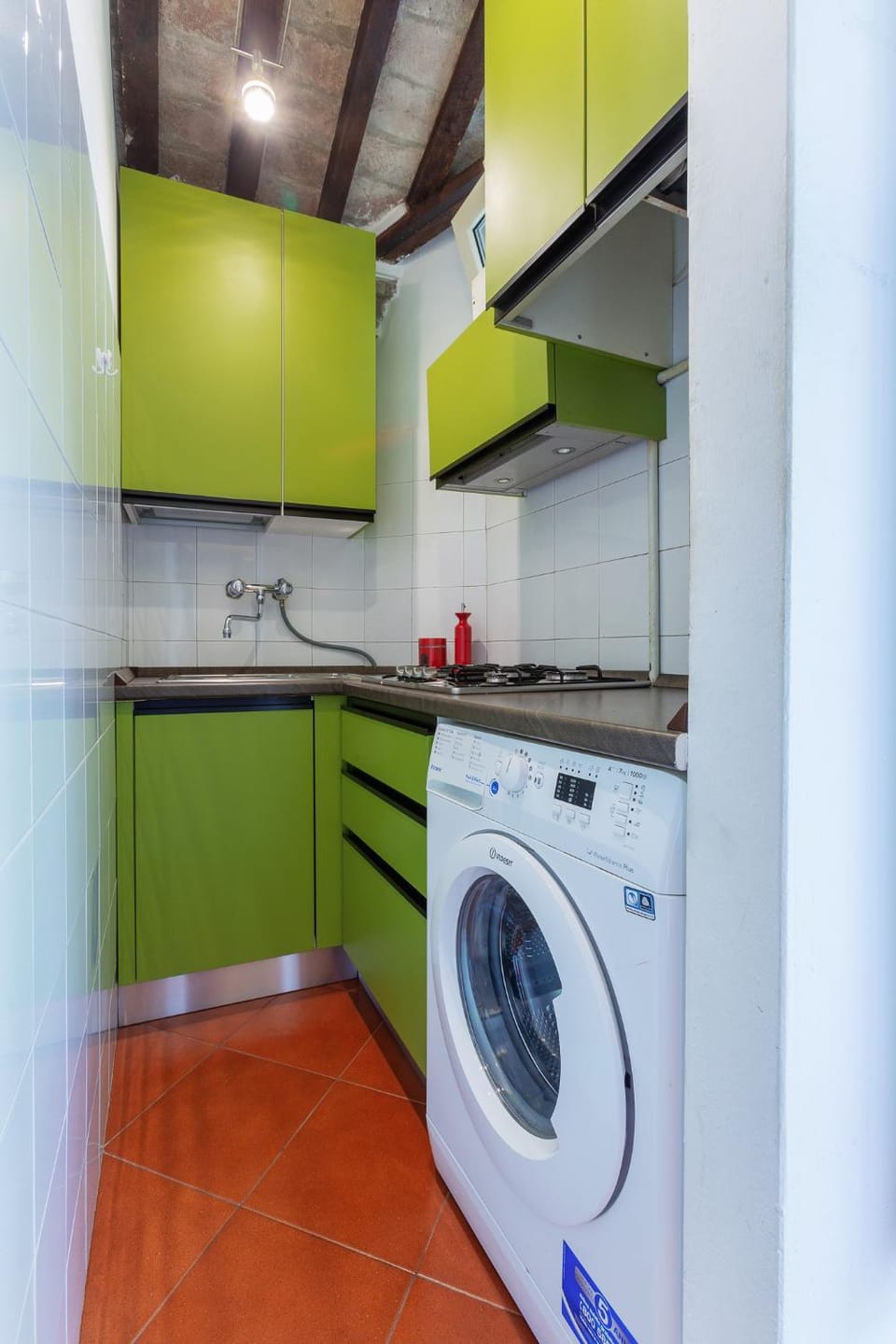 Kitchen or kitchenette, washing machine