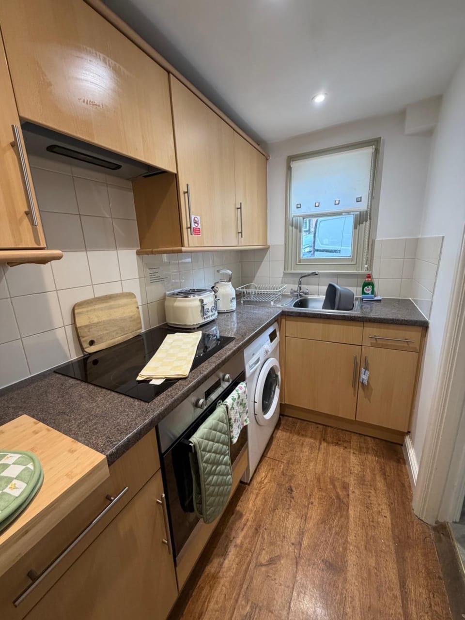 Kitchen or kitchenette, stove, toaster