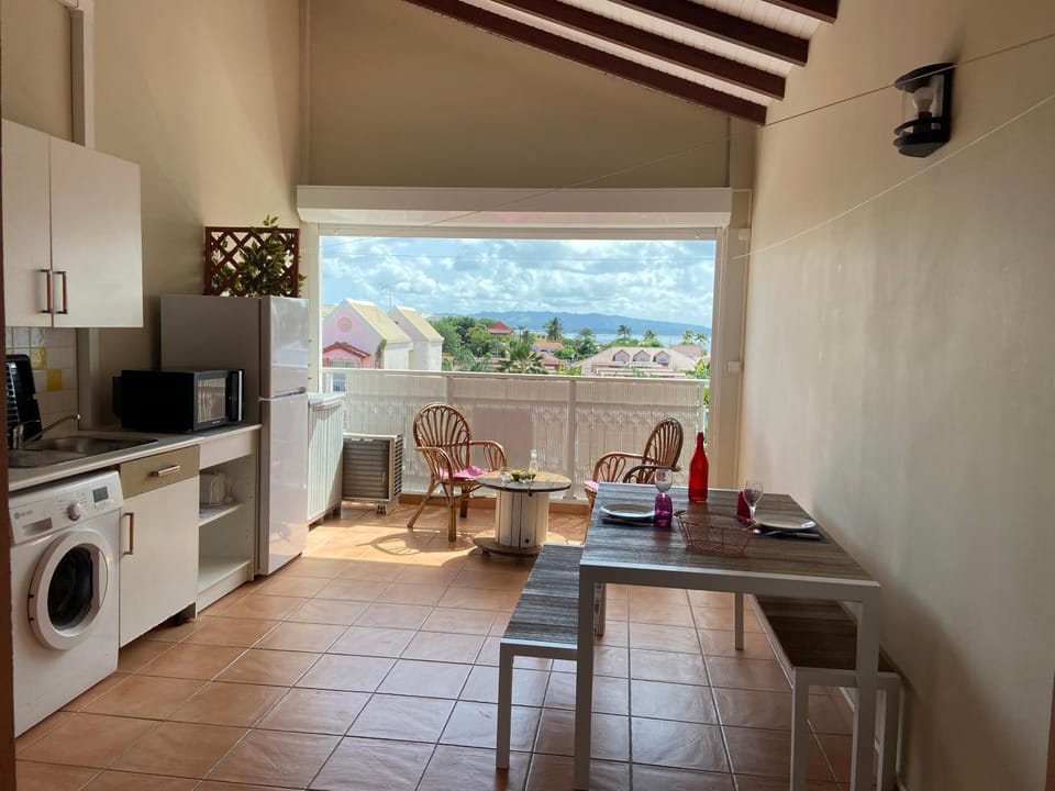 Patio, Kitchen or kitchenette, Dining area, Sea view
