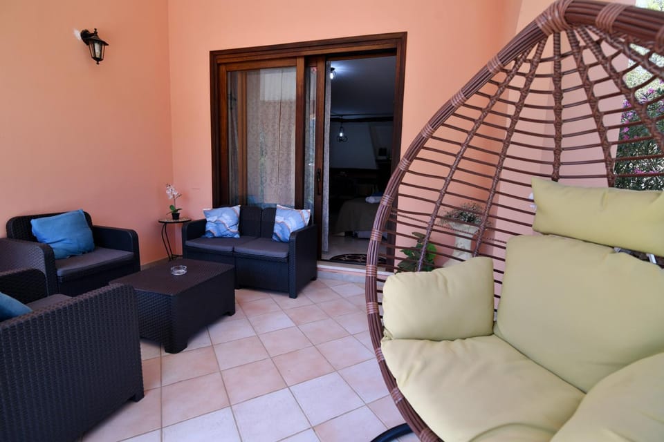 Patio, Bed, Living room, Seating area
