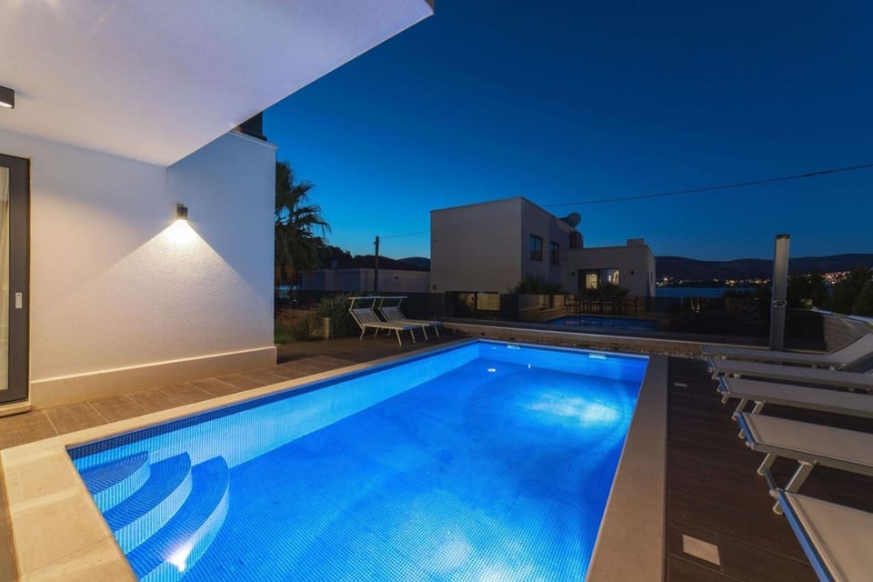 Patio, Night, Balcony/Terrace, Pool view, Swimming pool, Swimming pool, sunbed