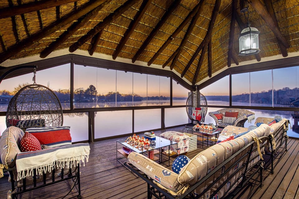 Patio, Day, Natural landscape, View (from property/room), Balcony/Terrace, Living room, Decorative detail, Seating area, Lake view, River view, Time of day