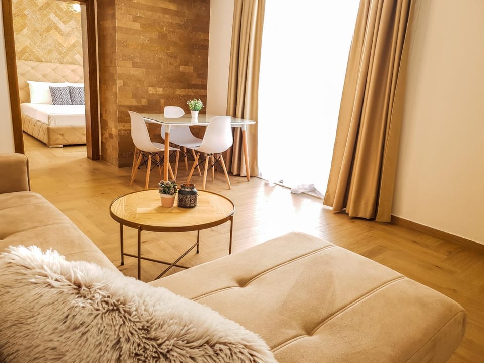 Bed, Living room, Seating area, Dining area