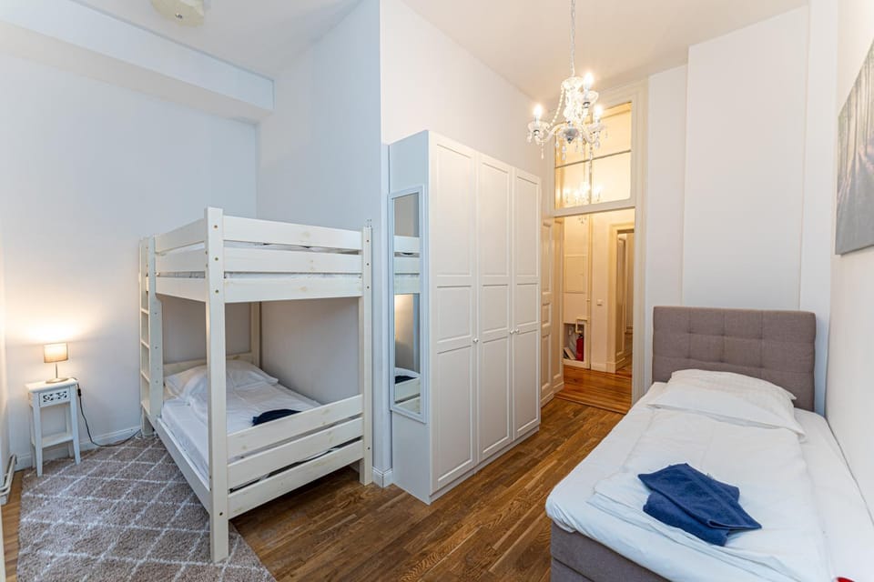Bed, Photo of the whole room, Bedroom, bunk bed, towels, wardrobe