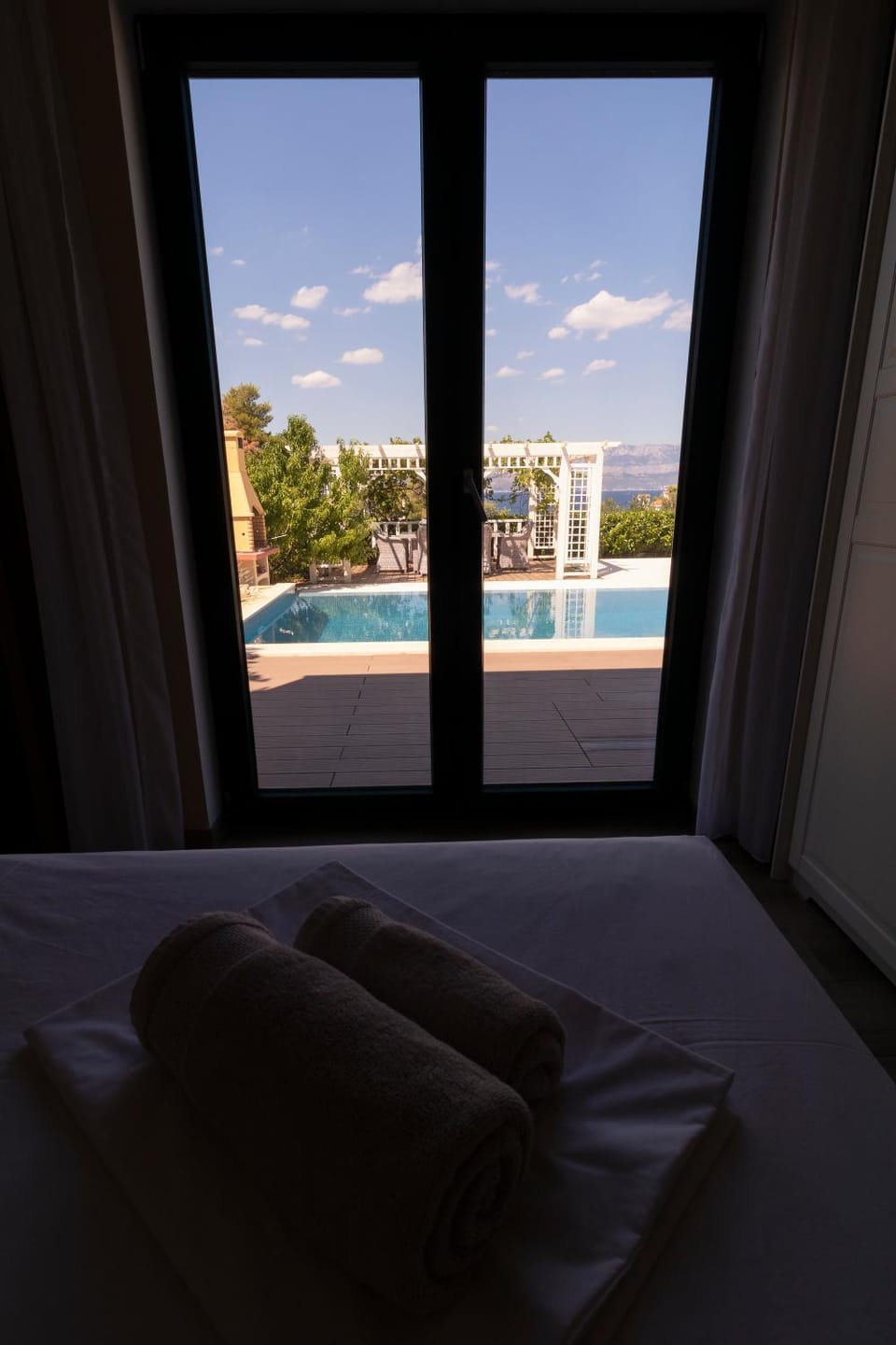 Bed, Bedroom, Pool view, Swimming pool, towels