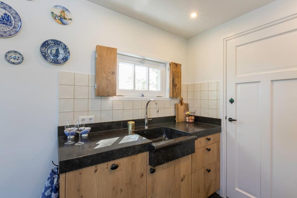 Welcome in - Vakantiewoning met grote tuin en green egg I Lepelstraat 18c Vrouwenpolder House in Vrouwenpolder