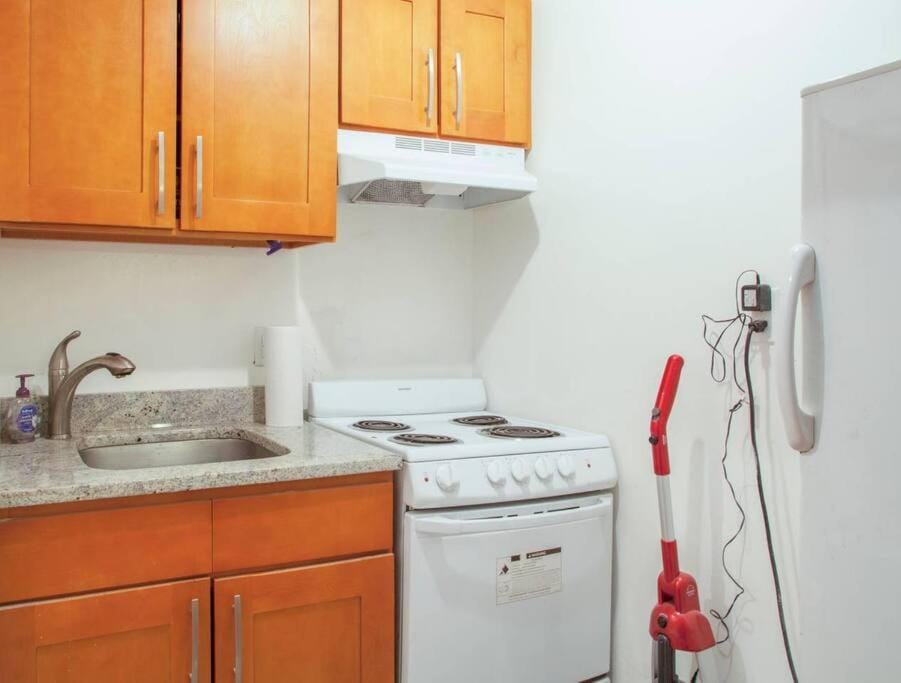 Kitchen or kitchenette, dishwasher, oven, stove, dryer