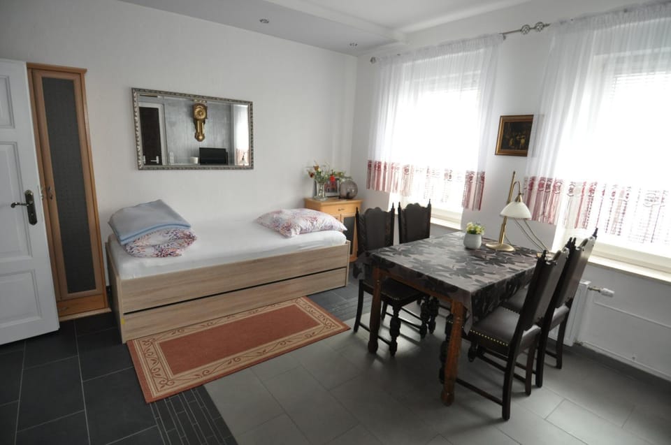 Bed, Living room, Seating area