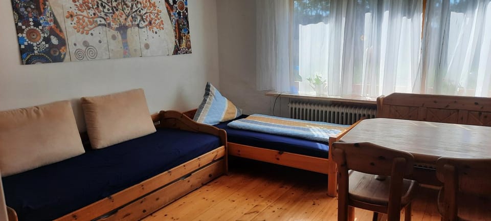 Bed, Living room, Seating area