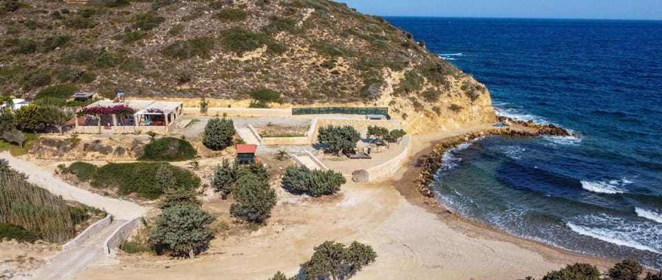 Property building, Nearby landmark, Day, Natural landscape, Bird's eye view, Beach, Sea view