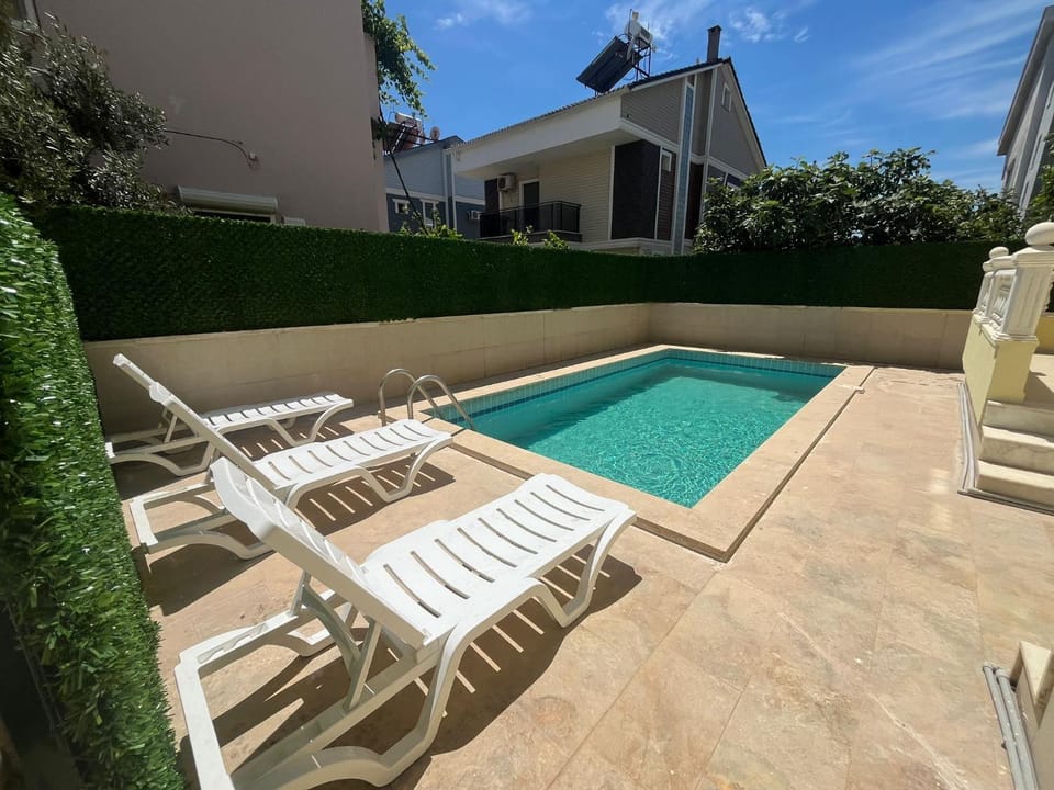 Patio, Day, Pool view, Swimming pool, sunbed