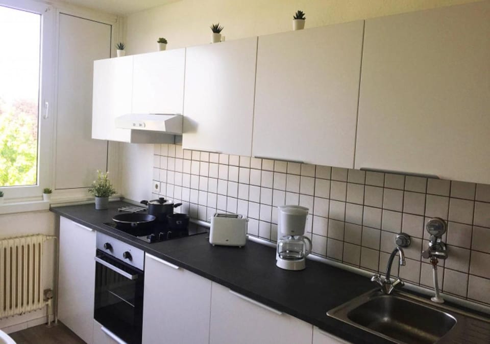 Kitchen or kitchenette, stove, toaster, kitchen