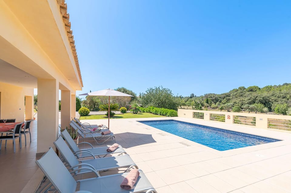 Patio, Day, Natural landscape, Pool view, Swimming pool, sunbed