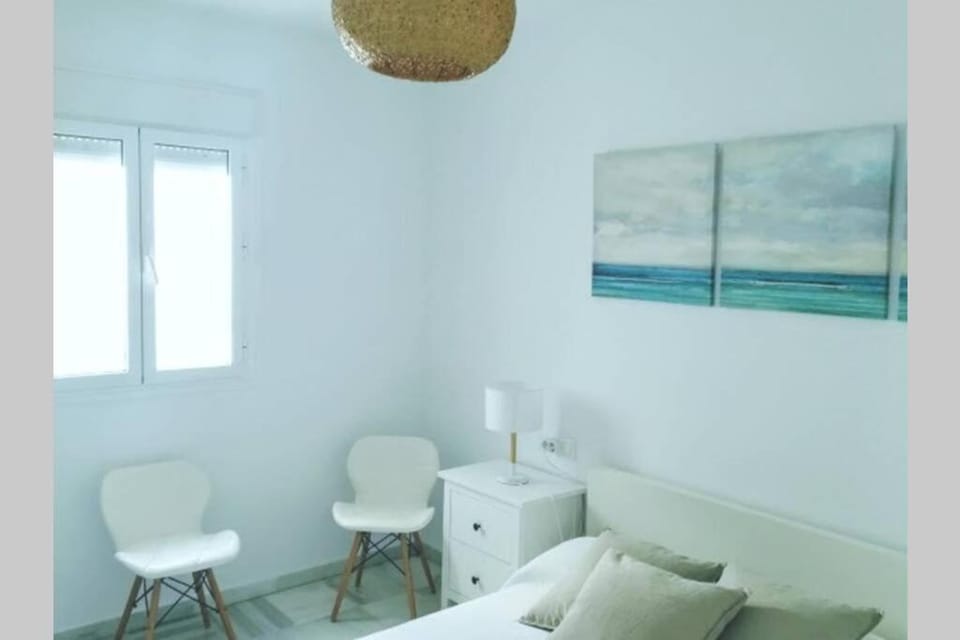 GARUM, luminoso apartamento con parking y patio privado Apartment in Conil de la Frontera