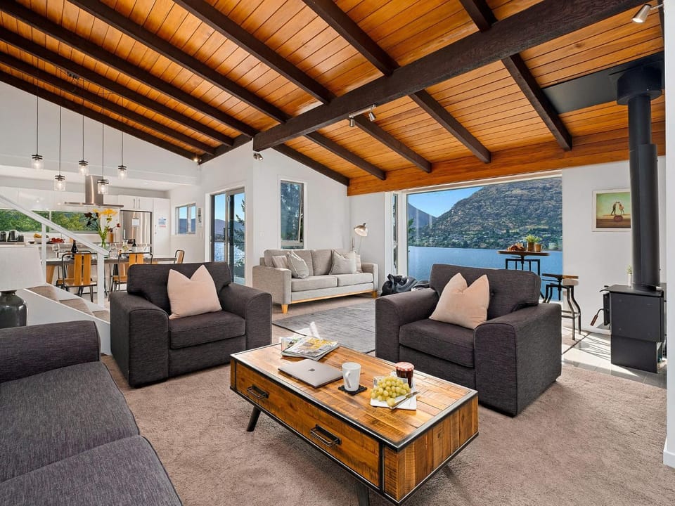 Living room, Seating area, Lake view, Mountain view, flat iron