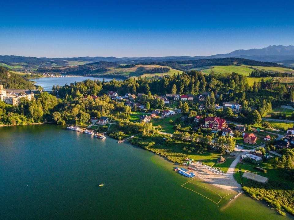 Nearby landmark, Day, Natural landscape, Bird's eye view, Beach, Hiking, City view, Lake view, Mountain view