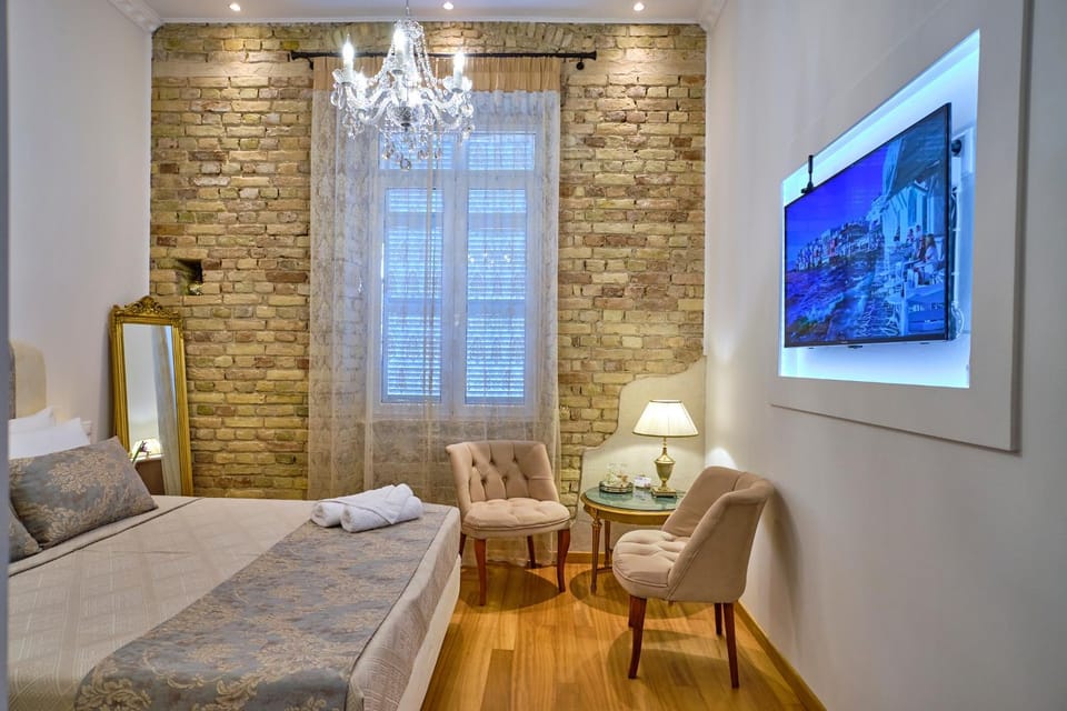 Bed, TV and multimedia, Photo of the whole room, Seating area, Bedroom, towels