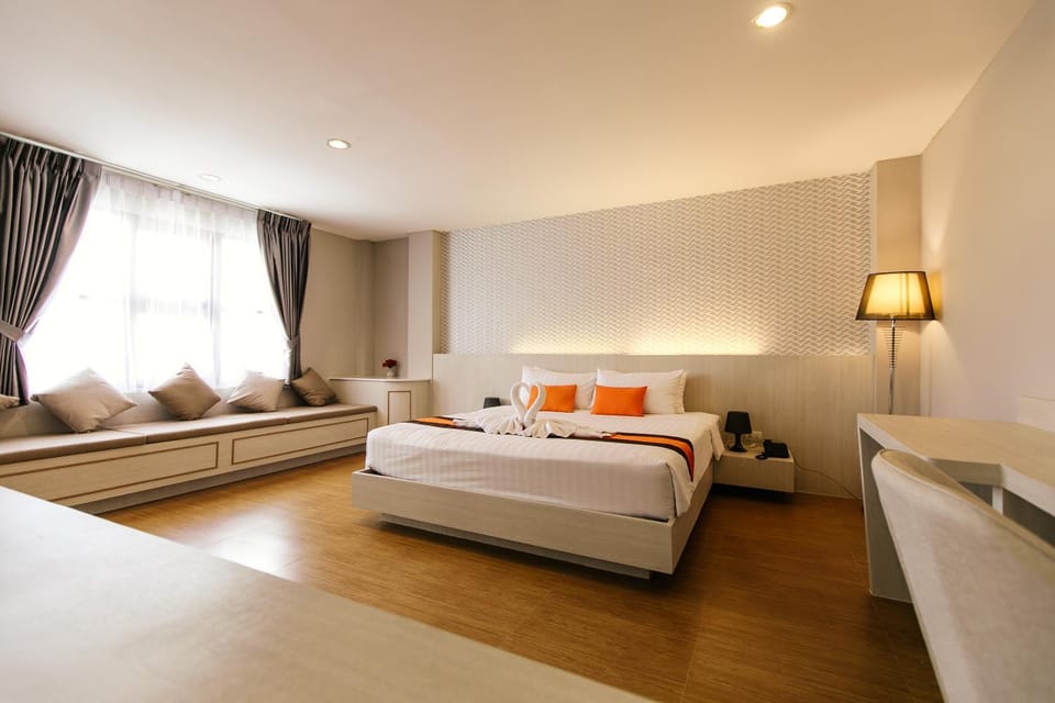 Bed, Living room, Seating area, Bedroom