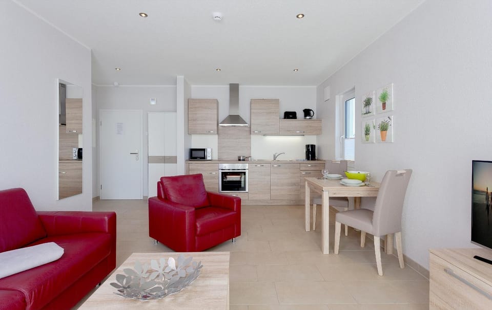 Kitchen or kitchenette, Living room, Seating area, Dining area