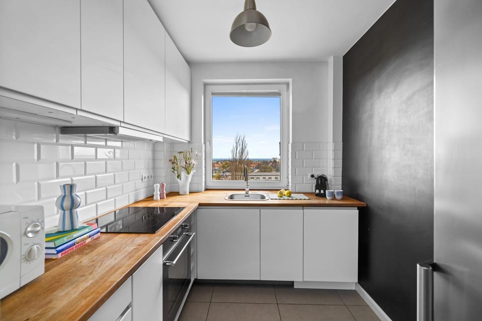Kitchen or kitchenette, microwave, oven, stove, kitchen