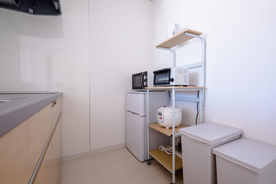 Kitchen or kitchenette, microwave, toaster