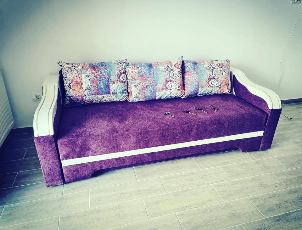 Bed, Living room, Seating area, Bedroom