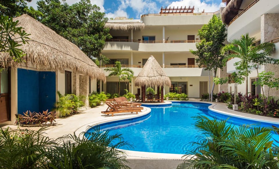 Property building, Natural landscape, Pool view, Swimming pool, sunbed